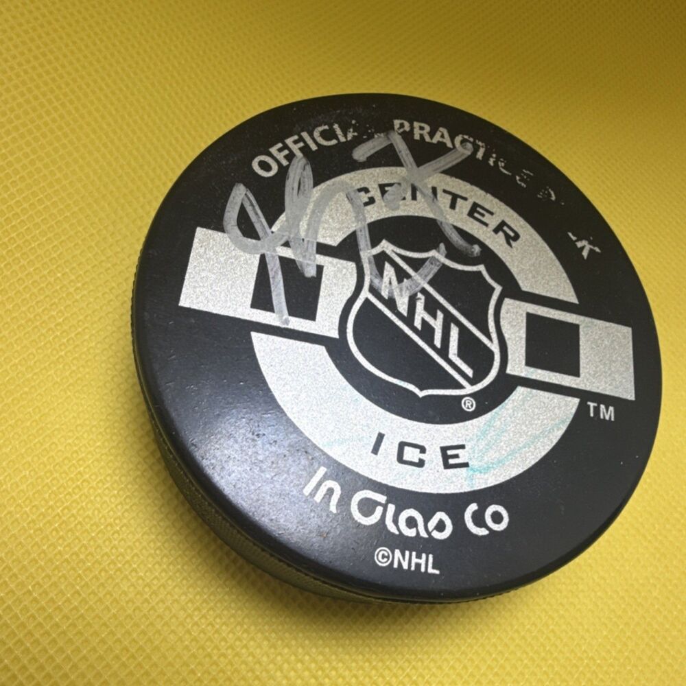 Autographed NHL Official Practice Hockey Puck In Glas Co Original